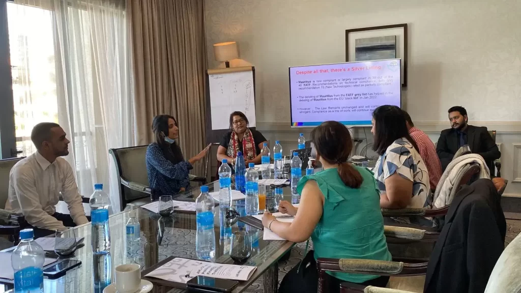 Participants seated at tables during a professional workshop